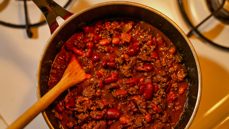 Simmering pot of meat chili