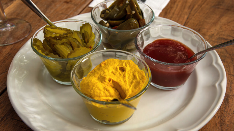 Sandwich condiments in serving bowls