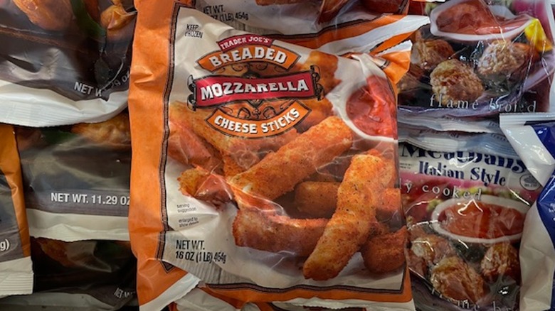 A bag of Trader Joe's mozzarella sticks in the store freezer case