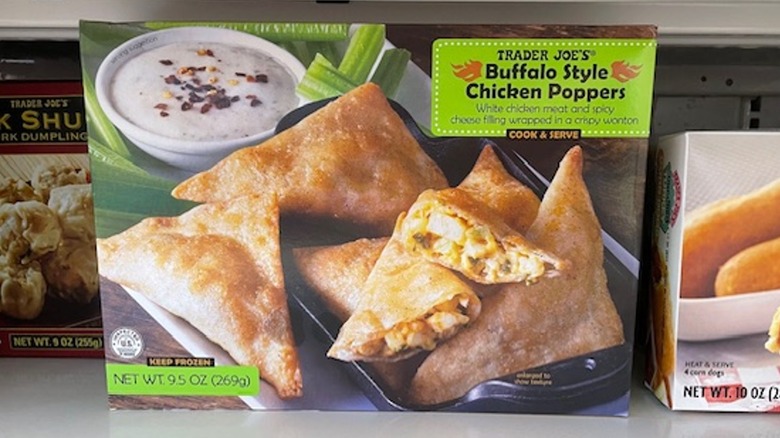 A box of Trader Joe's buffalo style chicken poppers on the store shelf