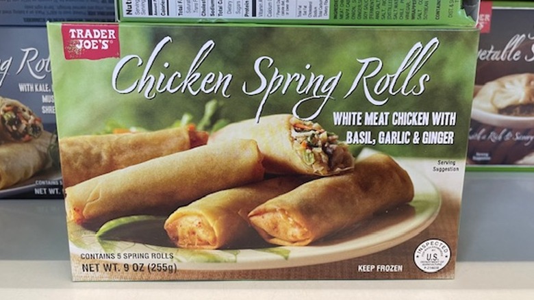 A box of Trader Joe's chicken spring rolls on the store shelf