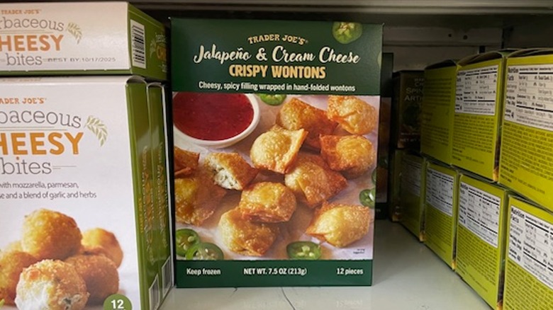 A box of Trader Joe's jalapeño and cream cheese crispy wontons on the store shelf