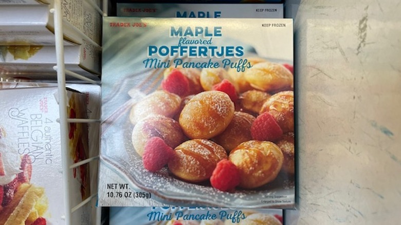 A box of Trader Joe's maple poffertjes in the store freezer case