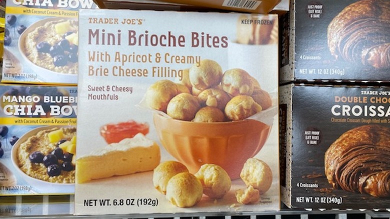 A box of Trader Joe's mini brioche bites in the store freezer case