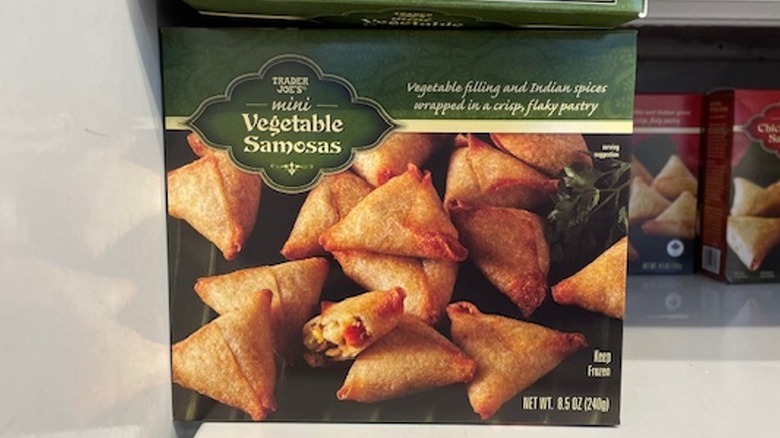 A box of Trader Joe's mini vegetable samosas on the store shelf