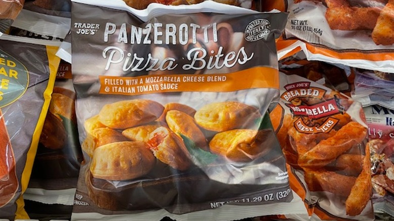 A bag of Trader Joe's Panzerotti pizza bites in the store freezer case