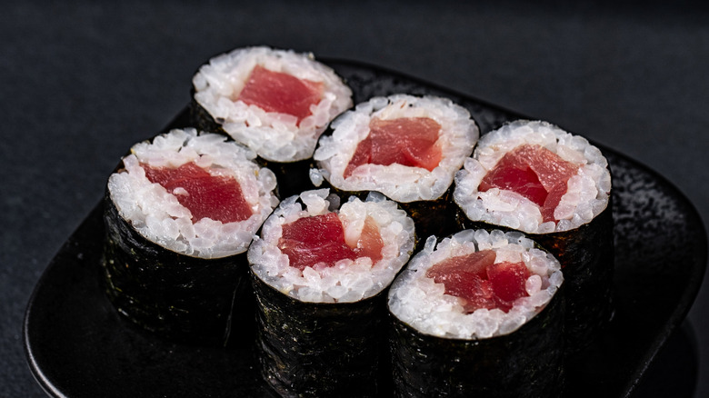 maki sushi on black plate