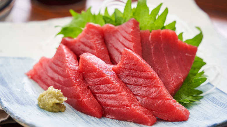 sliced tuna sashimi on plate