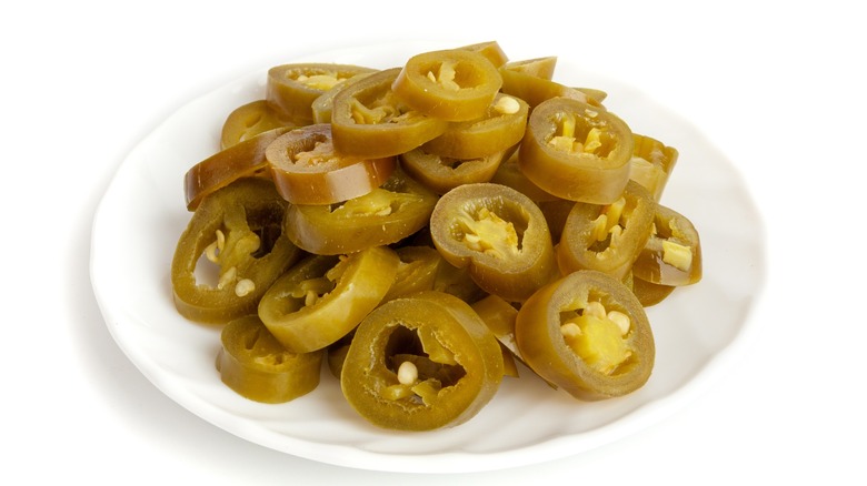 Plate of sliced jalapeno peppers