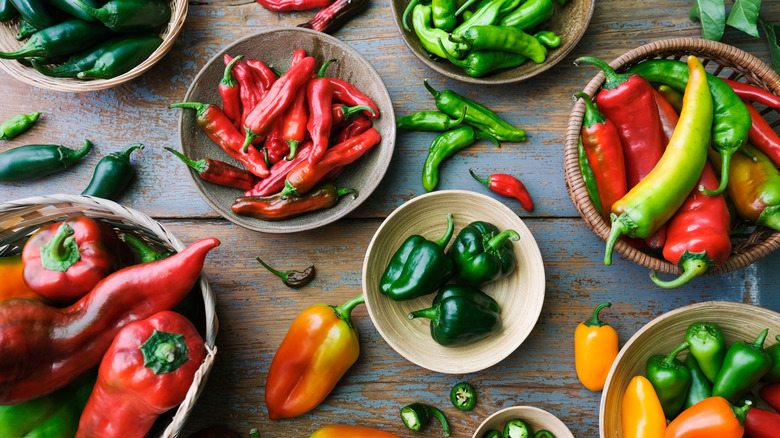 Variety of chili peppers in bowls
