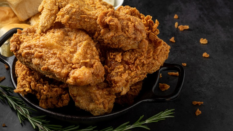 fried chicken in a cast iron pan