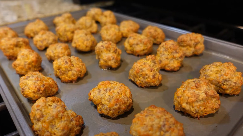 Sausage cheese balls on a baking sheet