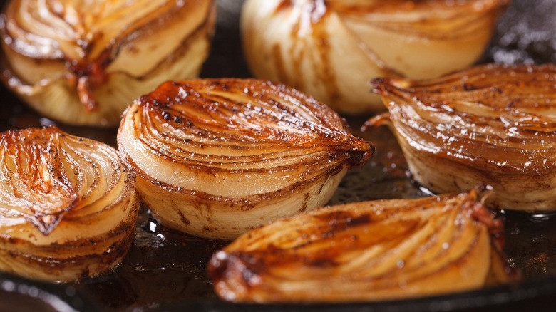 Roasted onions in a pan