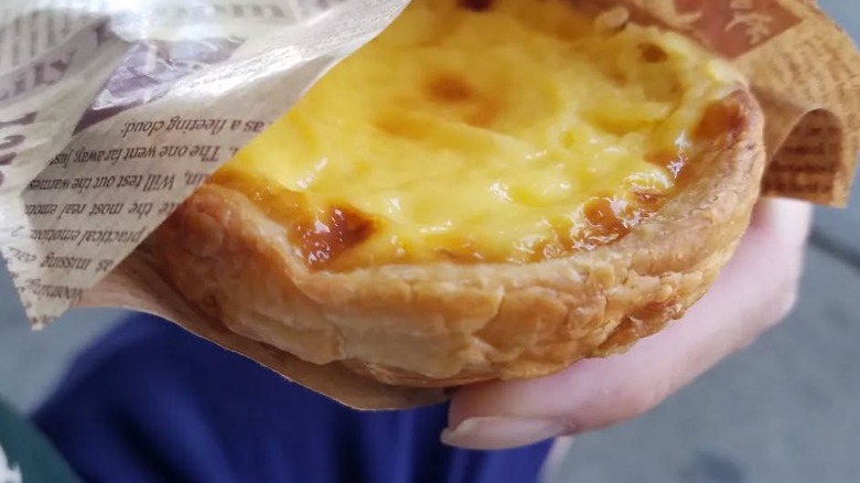 A wrapped egg tart at Xin Fa Bakery
