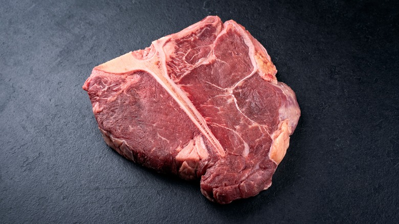 Raw porterhouse steak