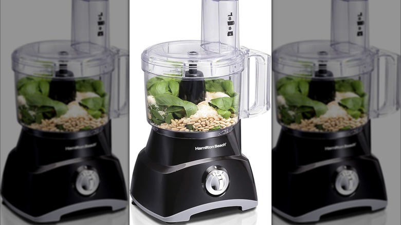 Hamilton Beach 8-Cup Food Processor with Compact Storage with greens and seeds inside