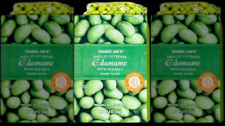 A package of Trader Joe's edamame on a black background