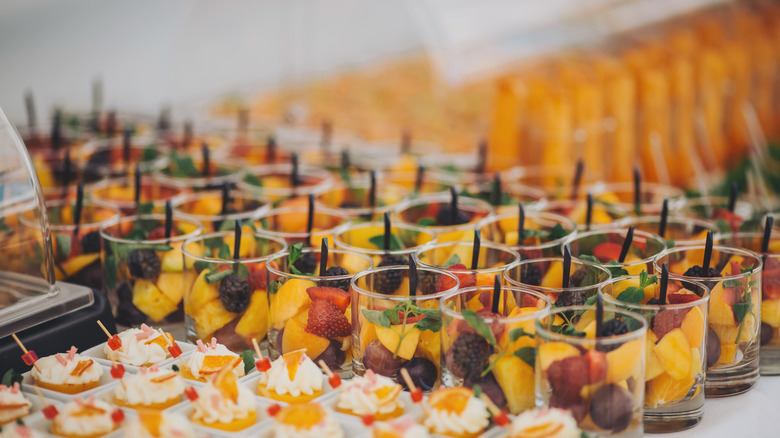 buffet table covered with beautiful desserts