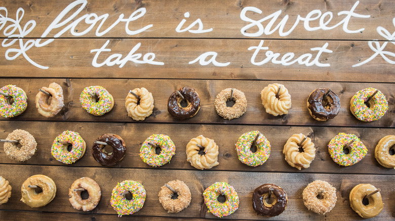 donuts hanging on donut wall