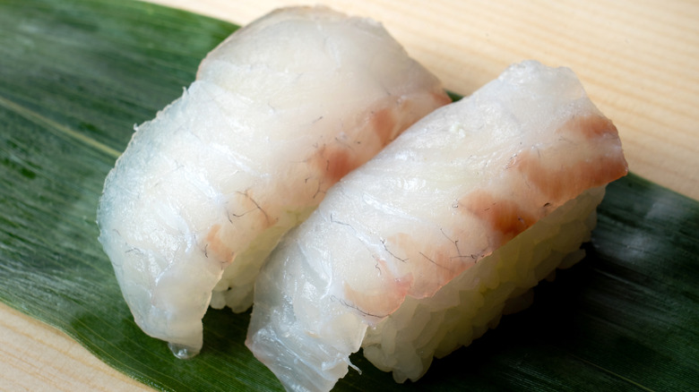 red snapper nigiri on leaf
