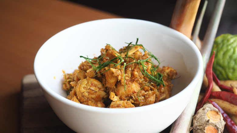 A white bowl of chicken Thai fried rice
