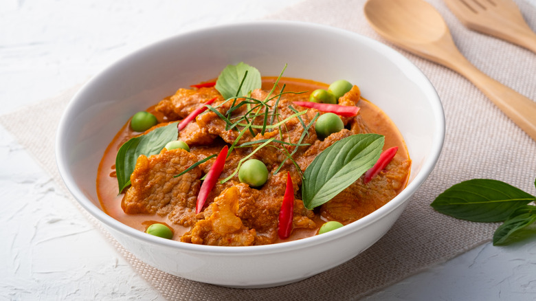 A white bowl with Panang curry