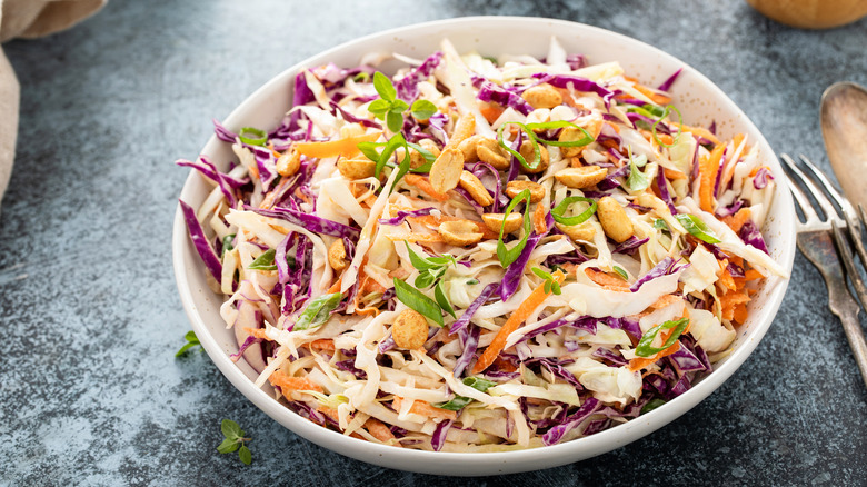 Asian coleslaw topped with peanuts