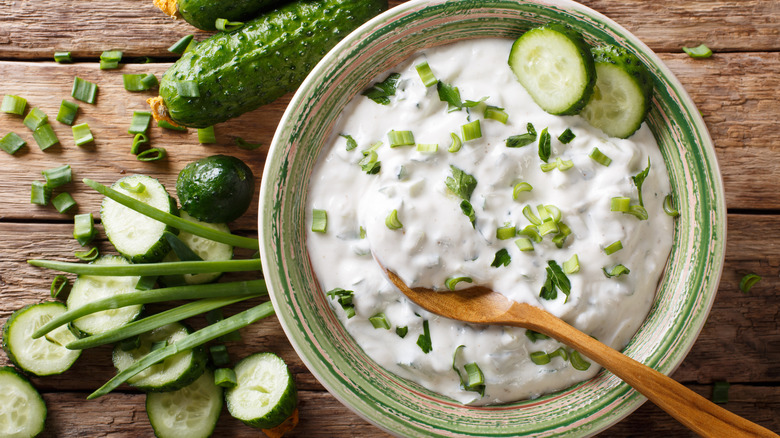 tzatziki in bowl with spoon