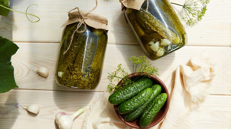 pickles in jars and bowl