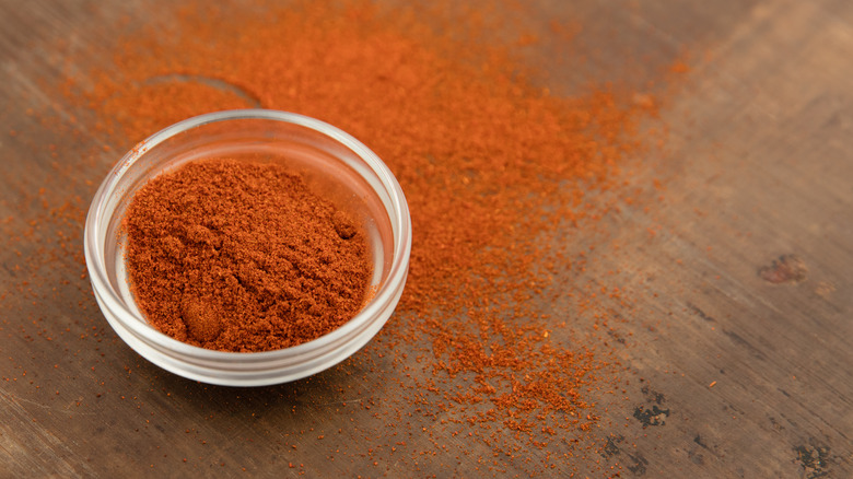 cayenne pepper on wooden table