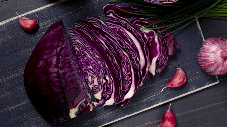 sliced red cabbage on board