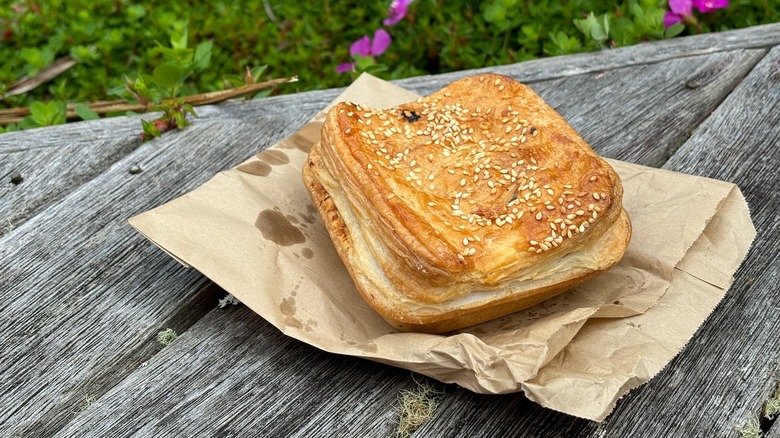 chicken and mushroom handpie with sesame seeds