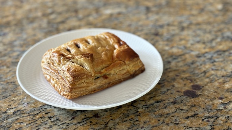 lamb and mint pie on white plate