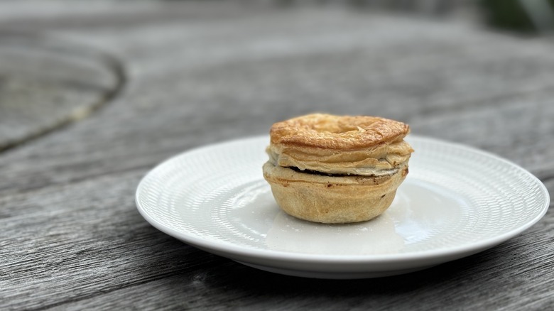 small mincemeat pie on white plate