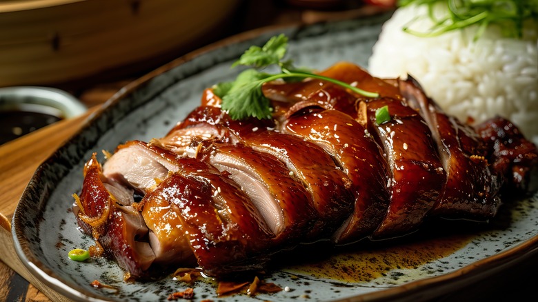 A plate of Peking duck with rice