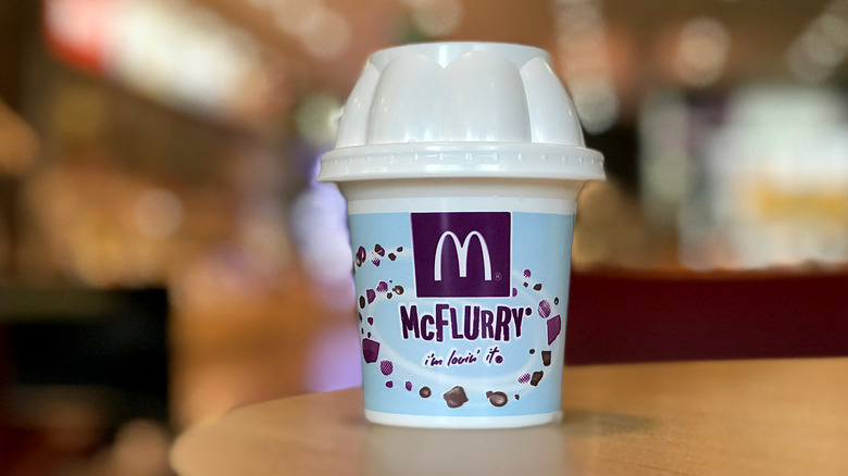 A McFlurry ice cream dessert in a takeaway container