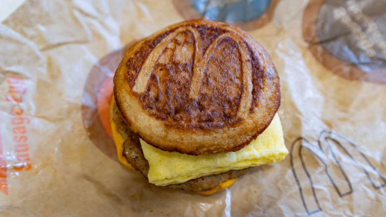 A McDonald's Sausage, Egg & Cheese McGriddle on a paper wrapper