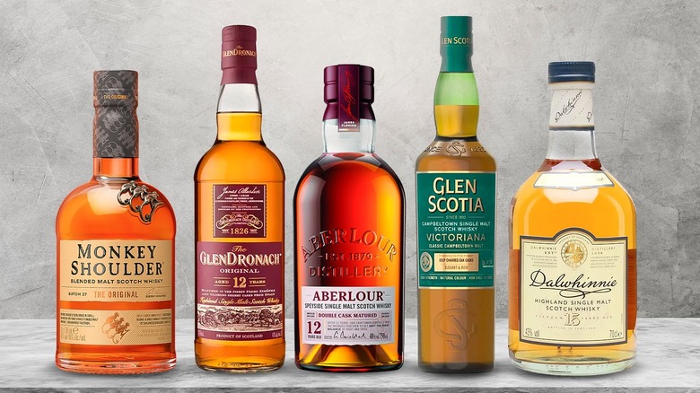 Five bottles of mid-range Scotch whiskies