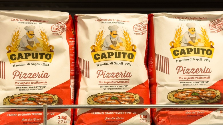 Bags of Caputo pizza flour lined up on store shelf