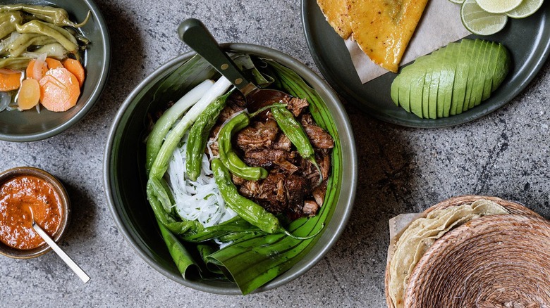 Damian's duck carnitas with shishito peppers