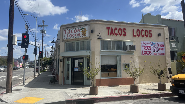 The exterior of Tacos Locos on the corner of Venice Blvd