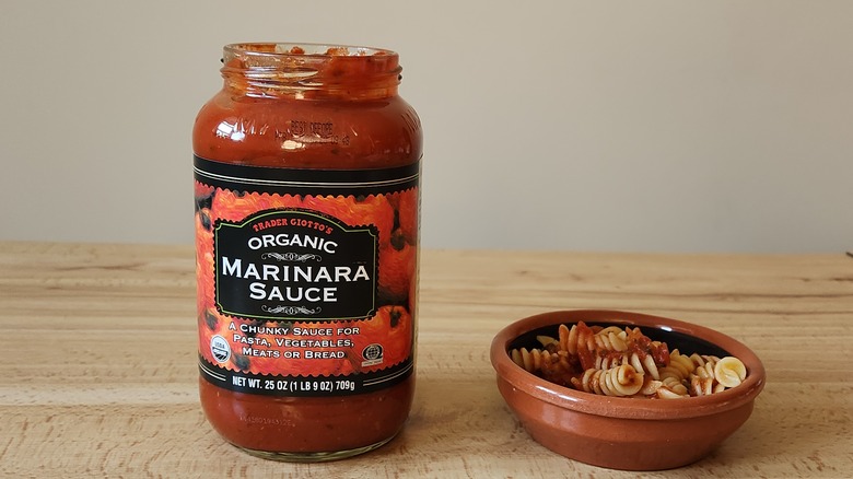 jarred marinara sauce on table