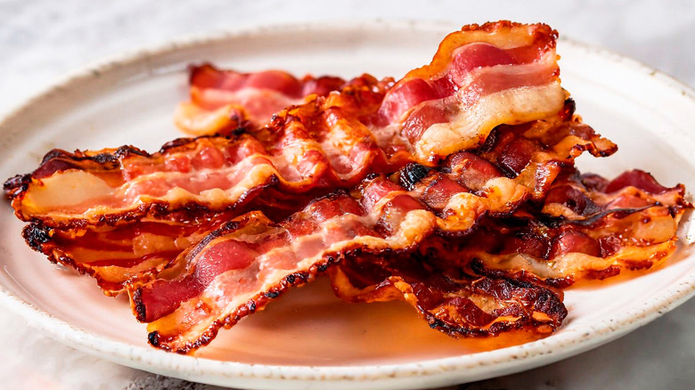 Plate of crispy bacon strips