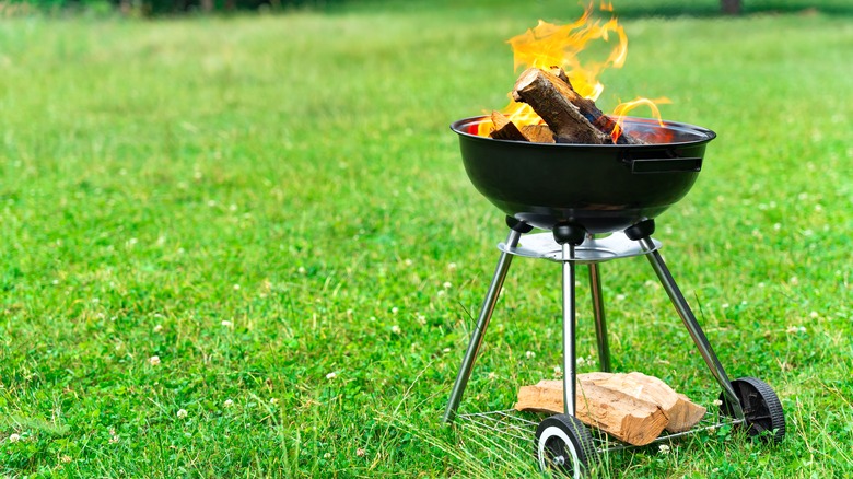 Barbecue with burning wood