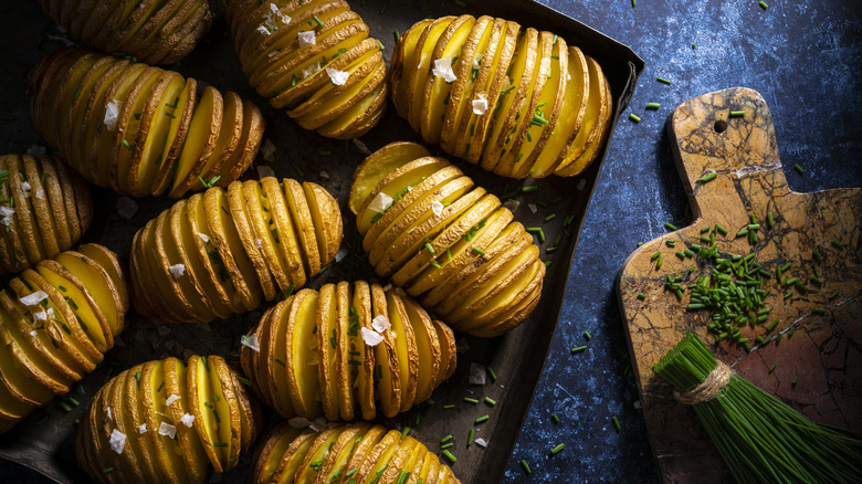 Hasselback potatoes on baking pan