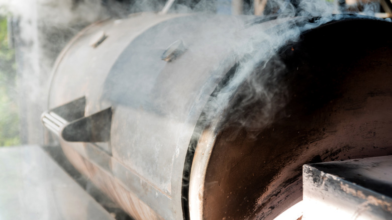 Barbecue smoker with smoke coming out