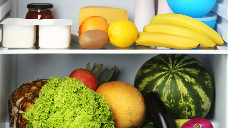 watermelon next to refrigerated produce