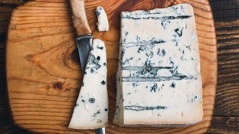 Gorgonzola cheese on cutting board