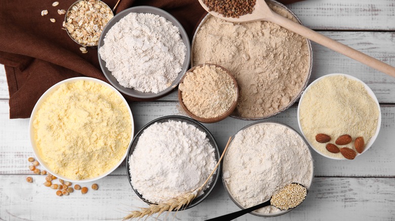 Multiple bowls filled with various styles of flours