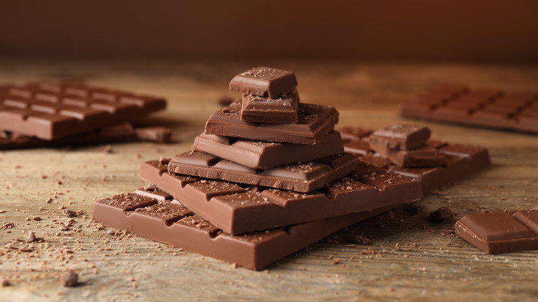 A stack of chocolate bars and squares
